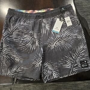 Rip Curl Black and White Board Shorts with Tropical Leaf Design